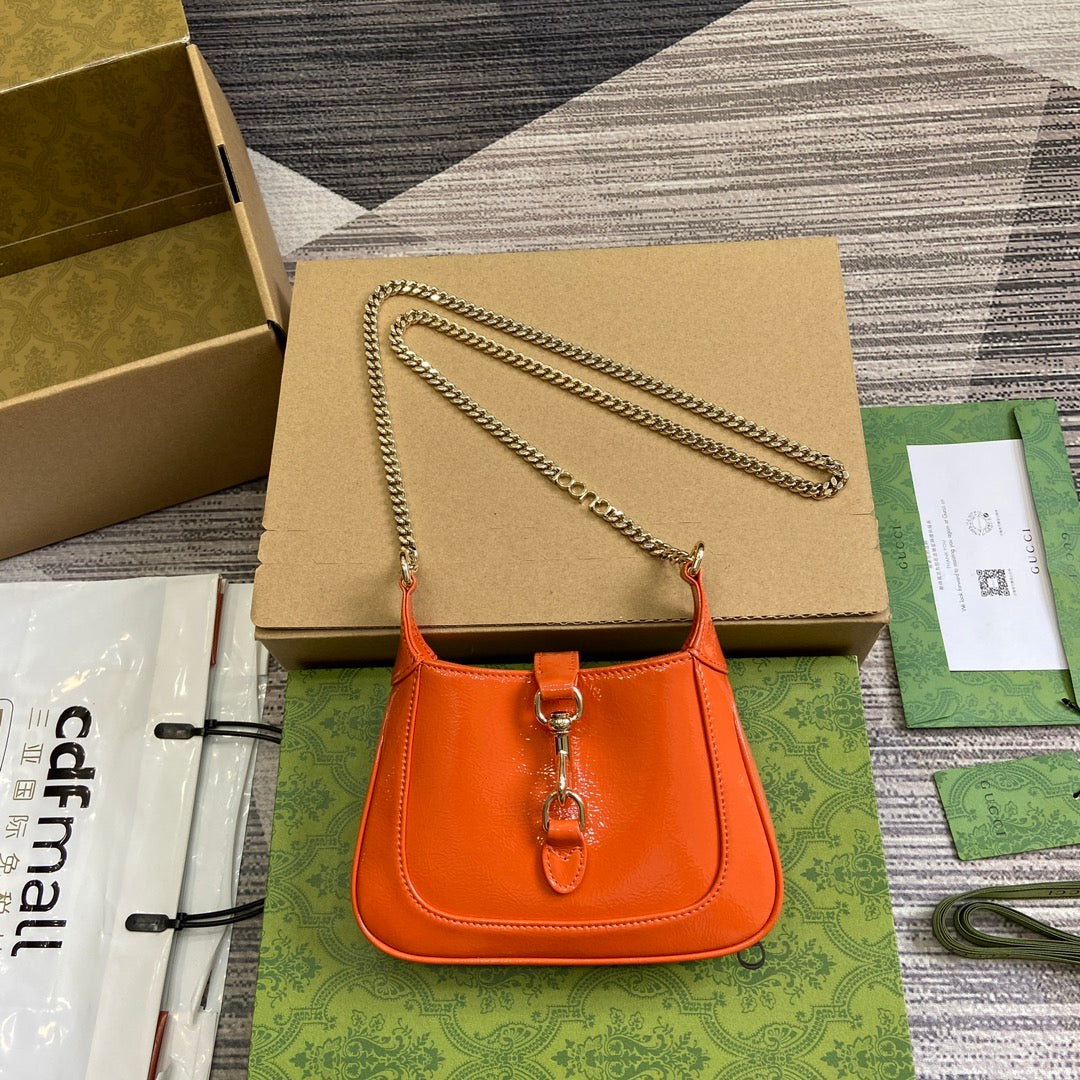 Gucci Jackie Notte Mini Bag 19 in Orange Cracked Lacquer Calfskin Gold Hardware