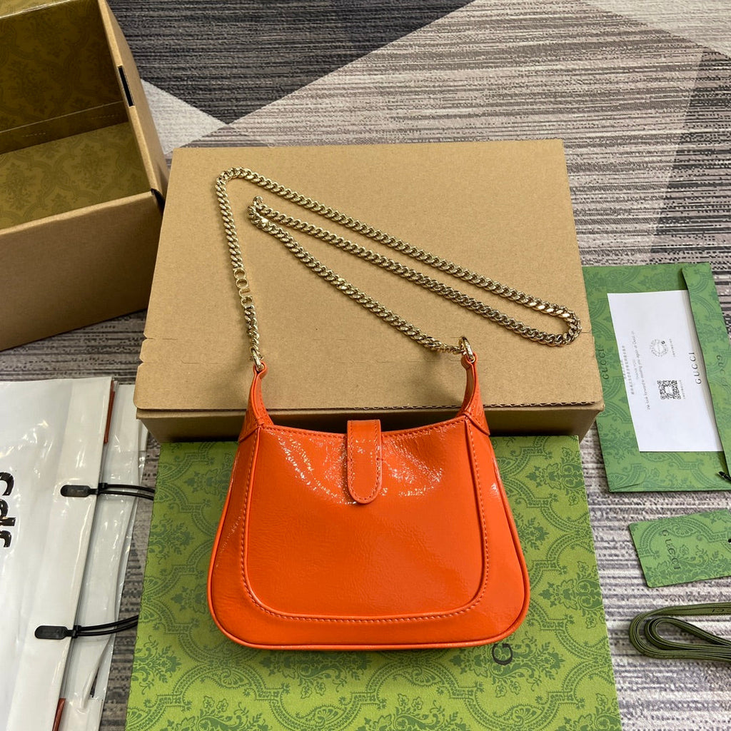 Gucci Jackie Notte Mini Bag 19 in Orange Cracked Lacquer Calfskin Gold Hardware