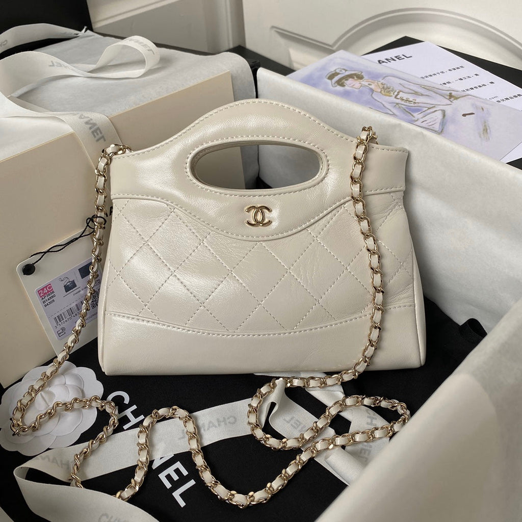 Chanel 25S Top Handle 20 cm in Cream White Lambskin Bag