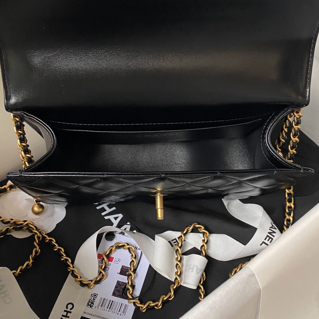 Chanel Flap Bag 22 in Black Calfskin with Double Gold Ball