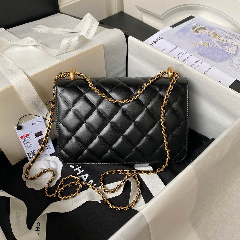 Chanel Flap Bag 22 in Black Calfskin with Double Gold Ball