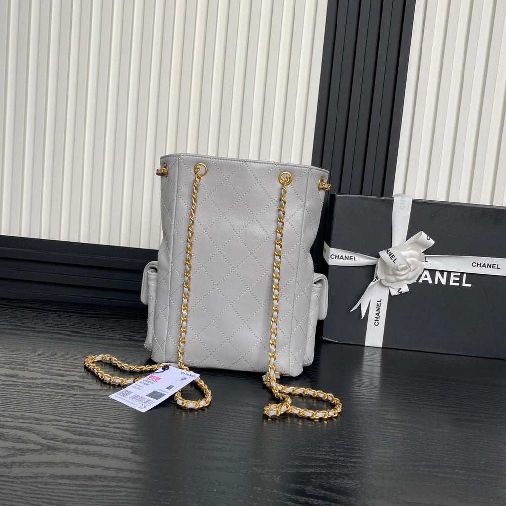 Chanel Cruise Drawstring Backpack 24 in Grey Lambskin Gold-Tone Metallic