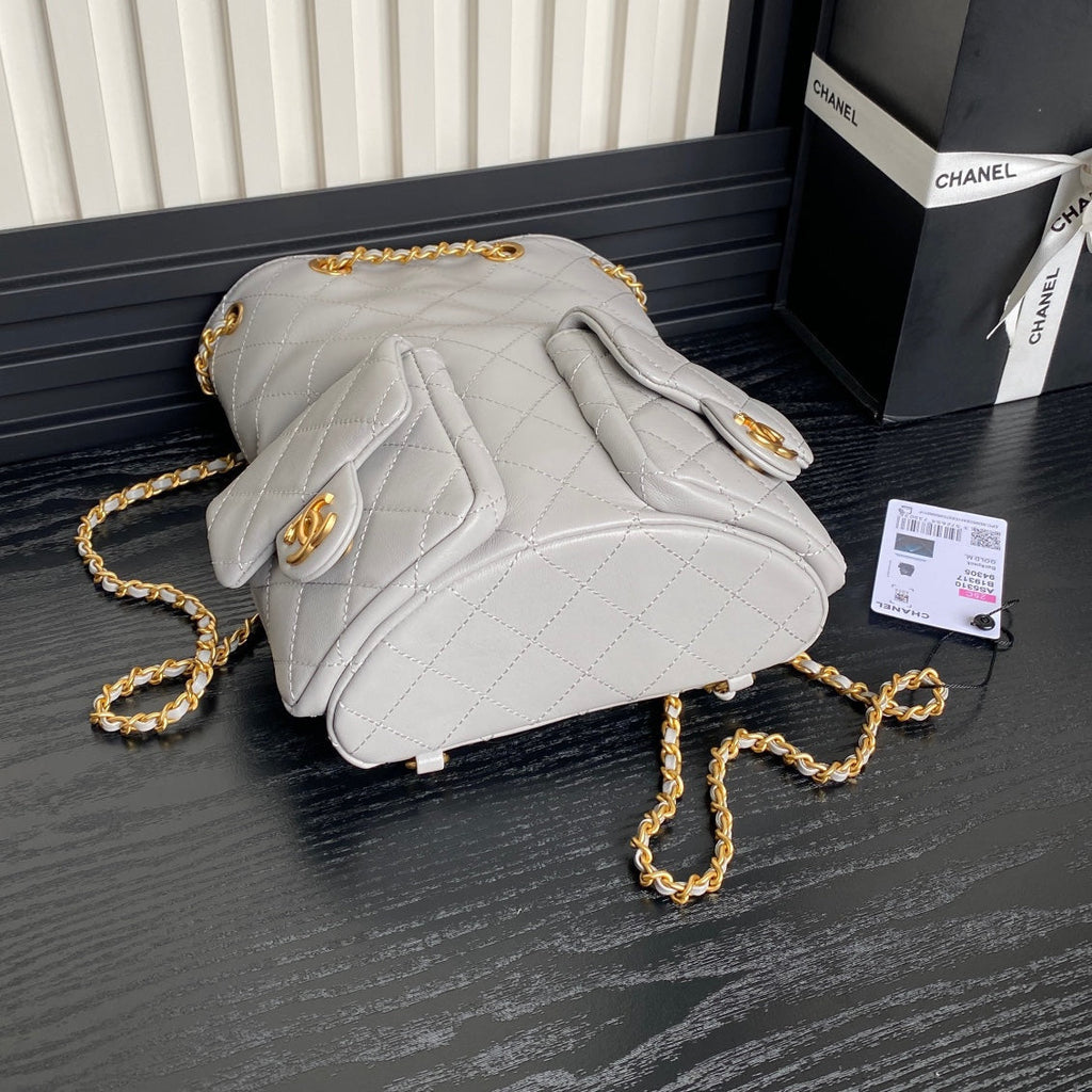 Chanel Cruise Drawstring Backpack 24 in Grey Lambskin Gold-Tone Metallic