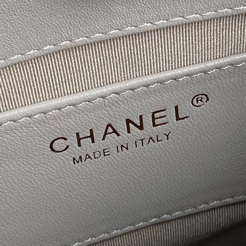 Chanel Cruise Drawstring Backpack 24 in Grey Lambskin Gold-Tone Metallic