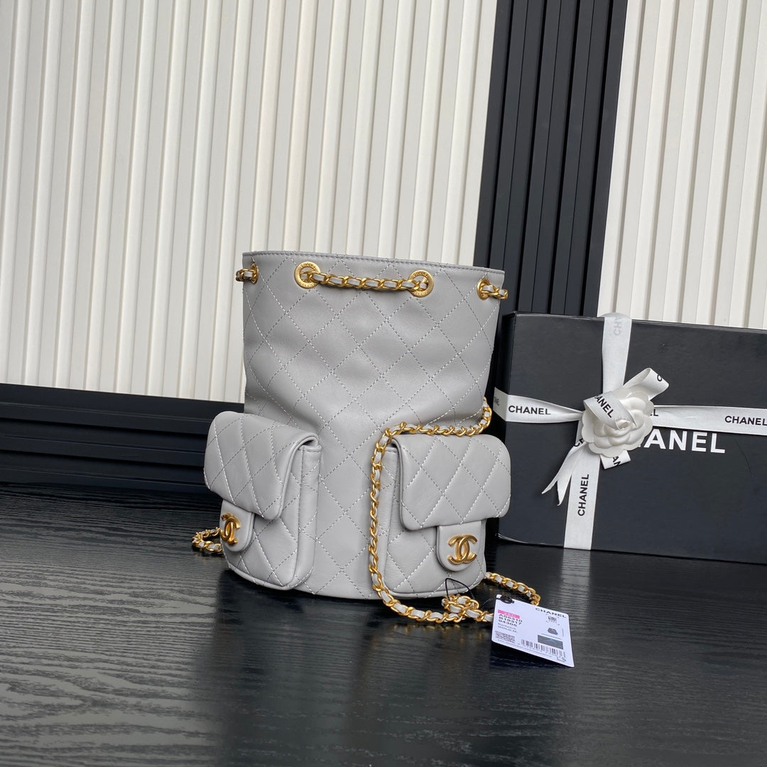Chanel Cruise Drawstring Backpack 24 in Grey Lambskin Gold-Tone Metallic