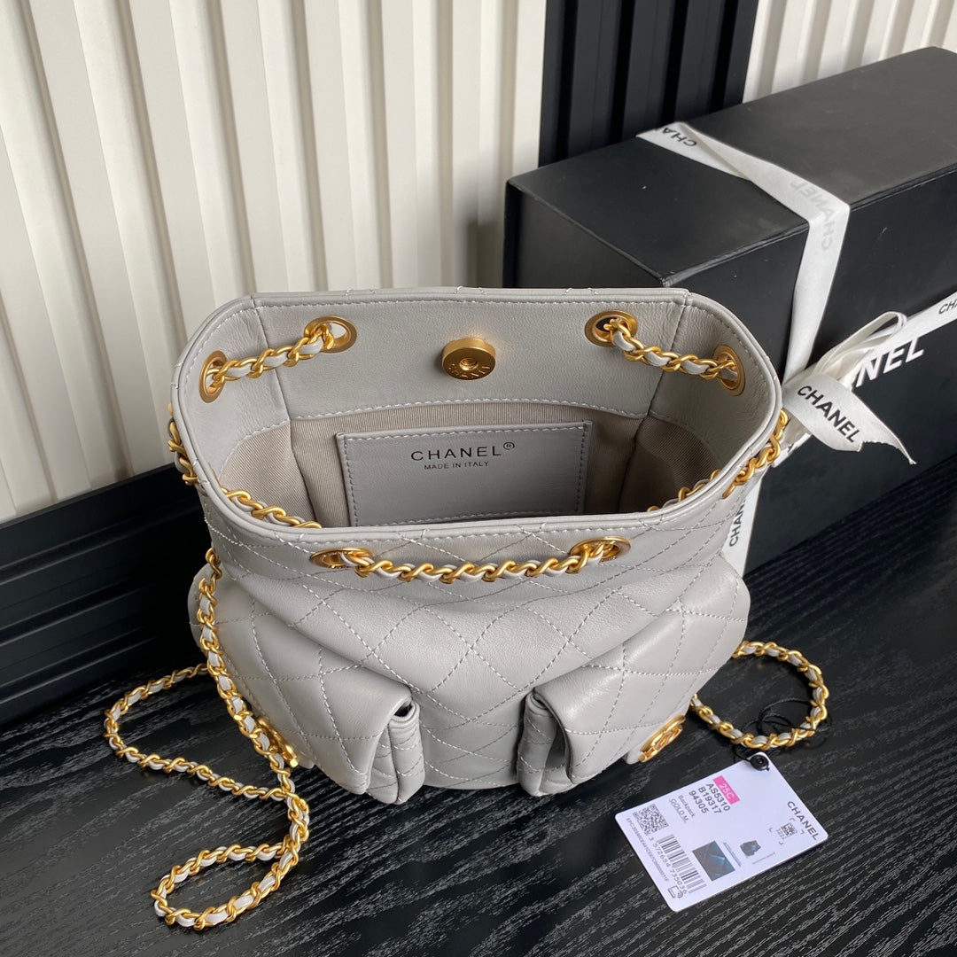 Chanel Cruise Drawstring Backpack 24 in Grey Lambskin Gold-Tone Metallic