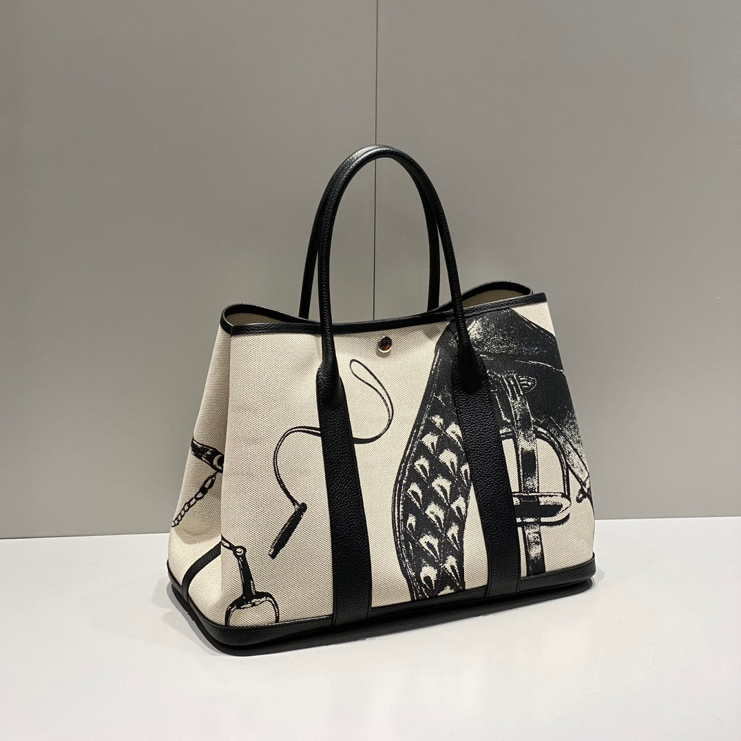 Hermes Garden Party 36 in Beige and Black Toile H Canvas Black Calfskin Horse Tack Sketch Print Bag