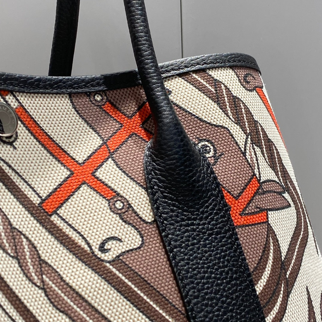 Hermes Garden Party 36 in Beige Orange and Brown Toile H Canvas Black Calfskin Horse Totem Print Bag