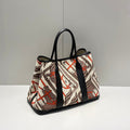 Hermes Garden Party 36 in Beige Orange and Brown Toile H Canvas Black Calfskin Horse Totem Print Bag