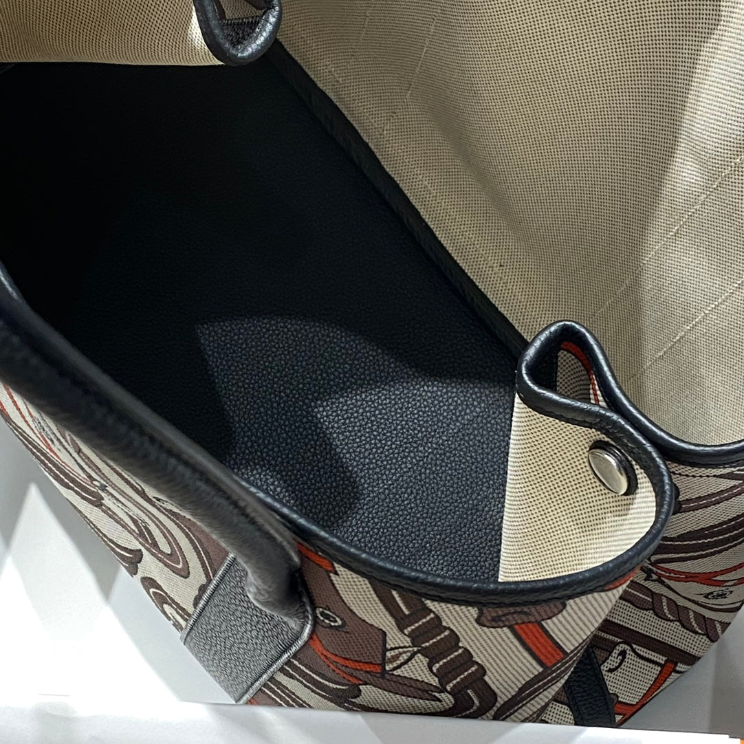 Hermes Garden Party 36 in Beige Orange and Brown Toile H Canvas Black Calfskin Horse Totem Print Bag