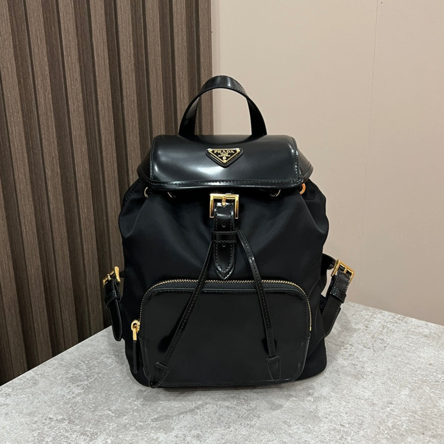 Prada Backpack 25 in Black Re-Nylon and Glossy Calfskin Gold Hardware