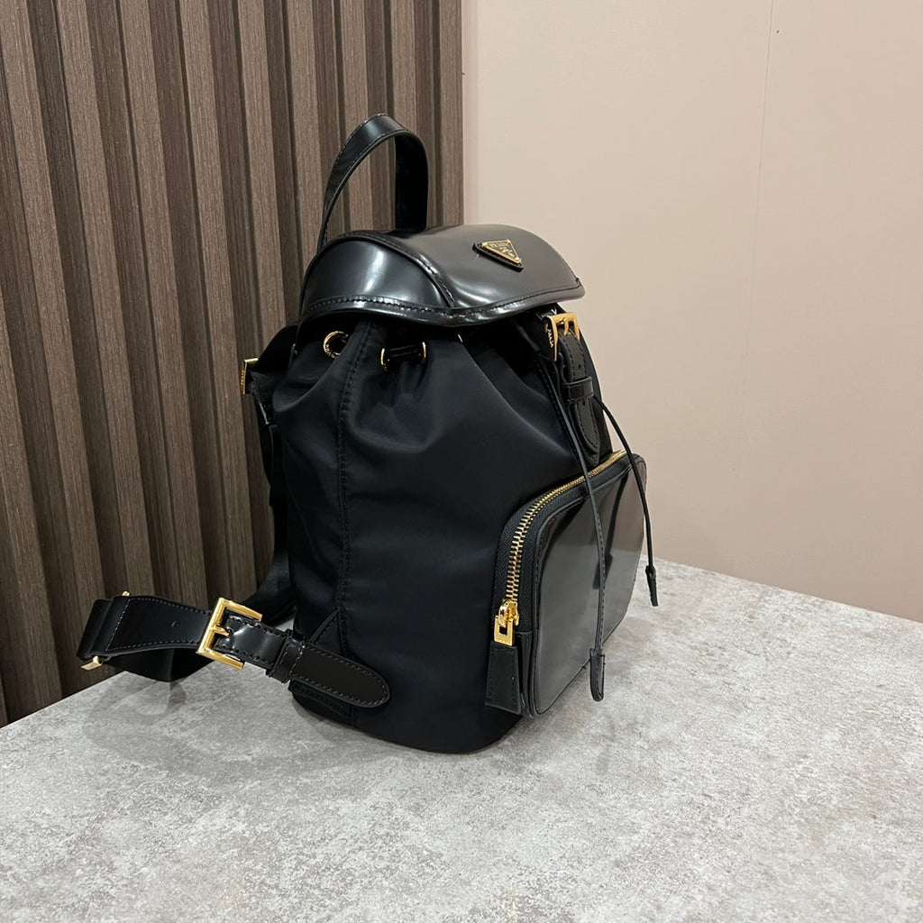 Prada Backpack 25 in Black Re-Nylon and Glossy Calfskin Gold Hardware
