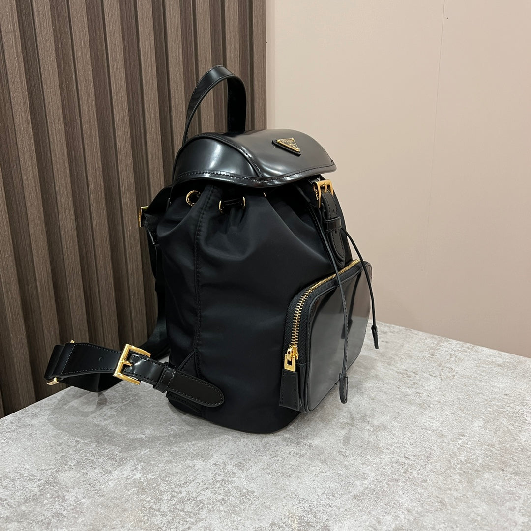 Prada Backpack 25 in Black Re-Nylon and Glossy Calfskin Gold Hardware