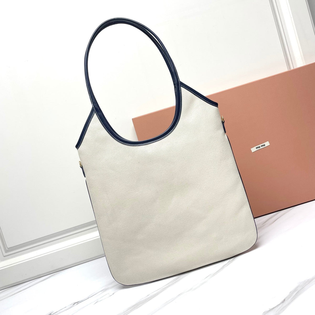 Ivy Tote Bag 40 in White Canvas and Navy Leather Trim