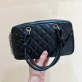 Chanel 25S Cambon Boston Bag 21 in Black Calfskin Silver Hardware