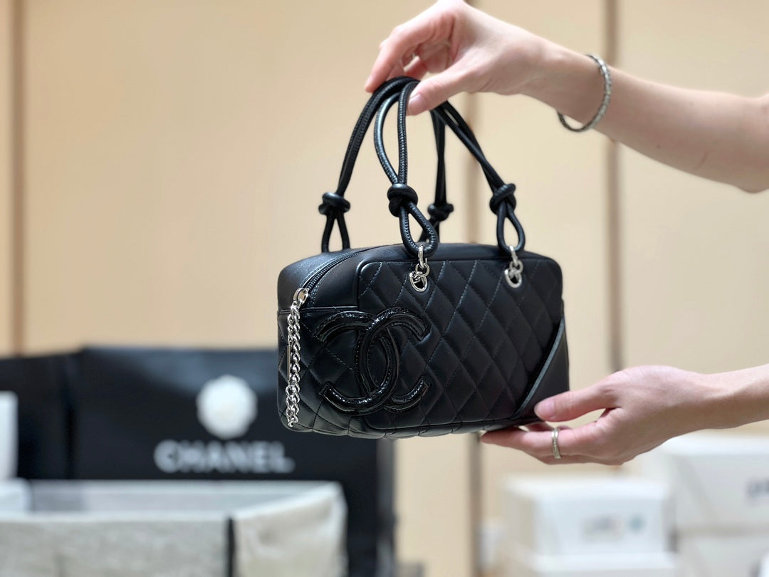 Chanel 25S Cambon Boston Bag 27 in Full Black Calfskin