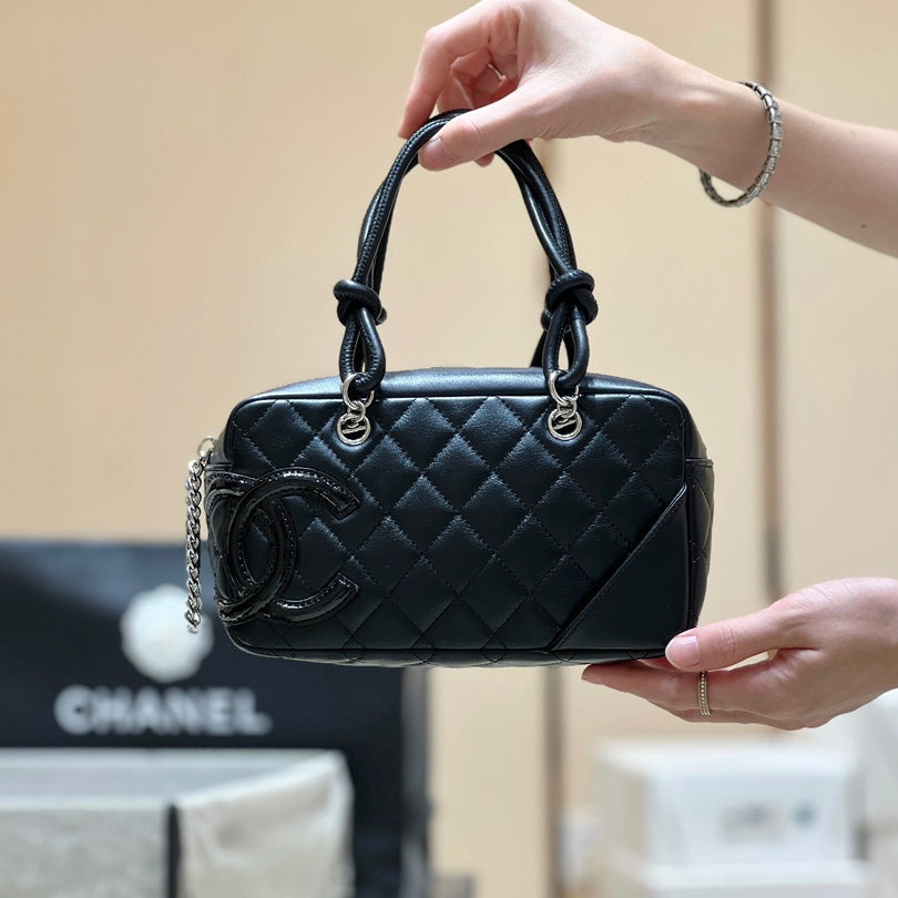 Chanel 25S Cambon Boston Bag 27 in Full Black Calfskin