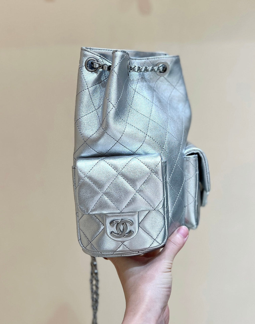 Chanel Drawstring Bucket Backpack 24 in Silver-Tone Lambskin Silver Hardware