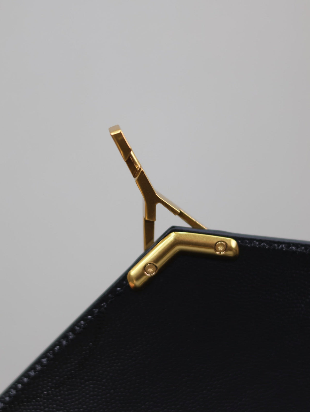 Saint Laurent Cassandra Top Handle Bag 24 in Black Calfskin Gold Hardware