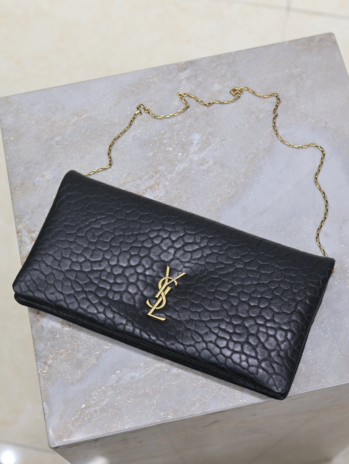 Saint Laurent Calypso Pouch 24 in Black Elephant Textured Lambskin Gold Logo