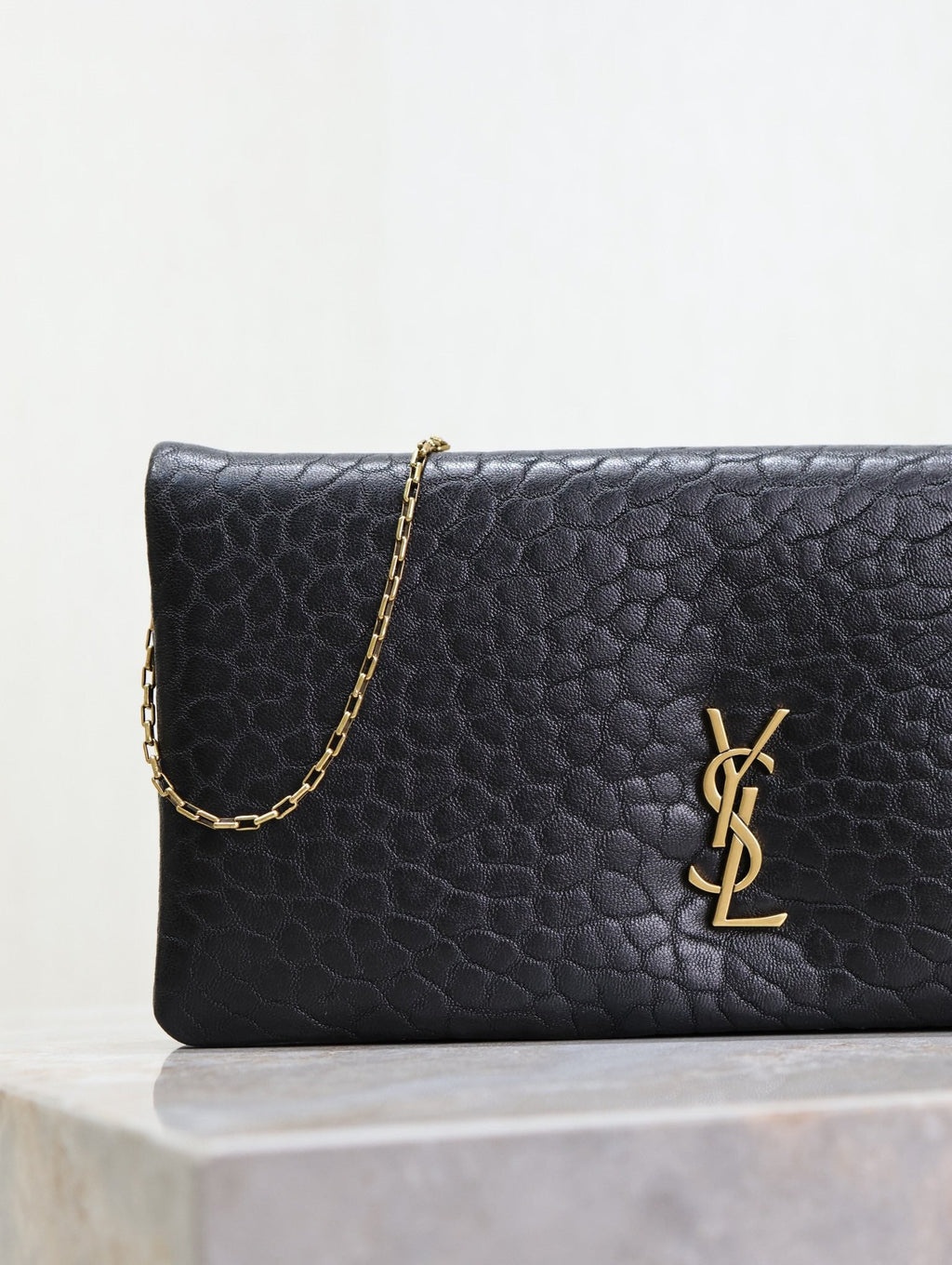 Saint Laurent Calypso Pouch 24 in Black Elephant Textured Lambskin Gold Logo