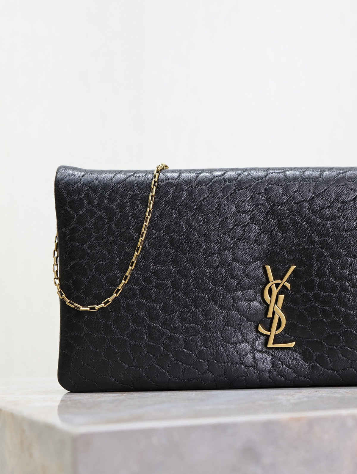 Saint Laurent Calypso Pouch 24 in Black Elephant Textured Lambskin Gold Logo