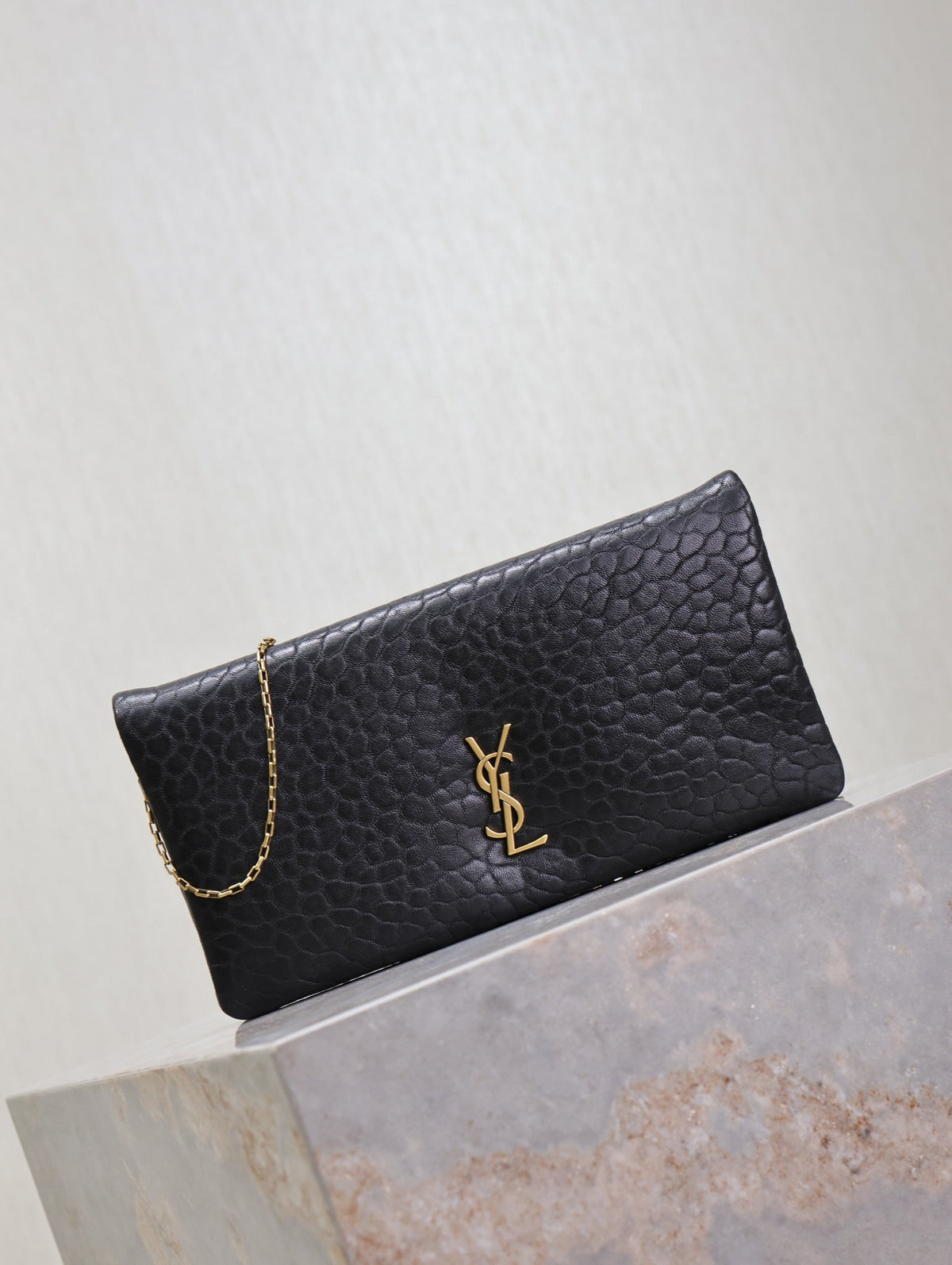 Saint Laurent Calypso Pouch 24 in Black Elephant Textured Lambskin Gold Logo