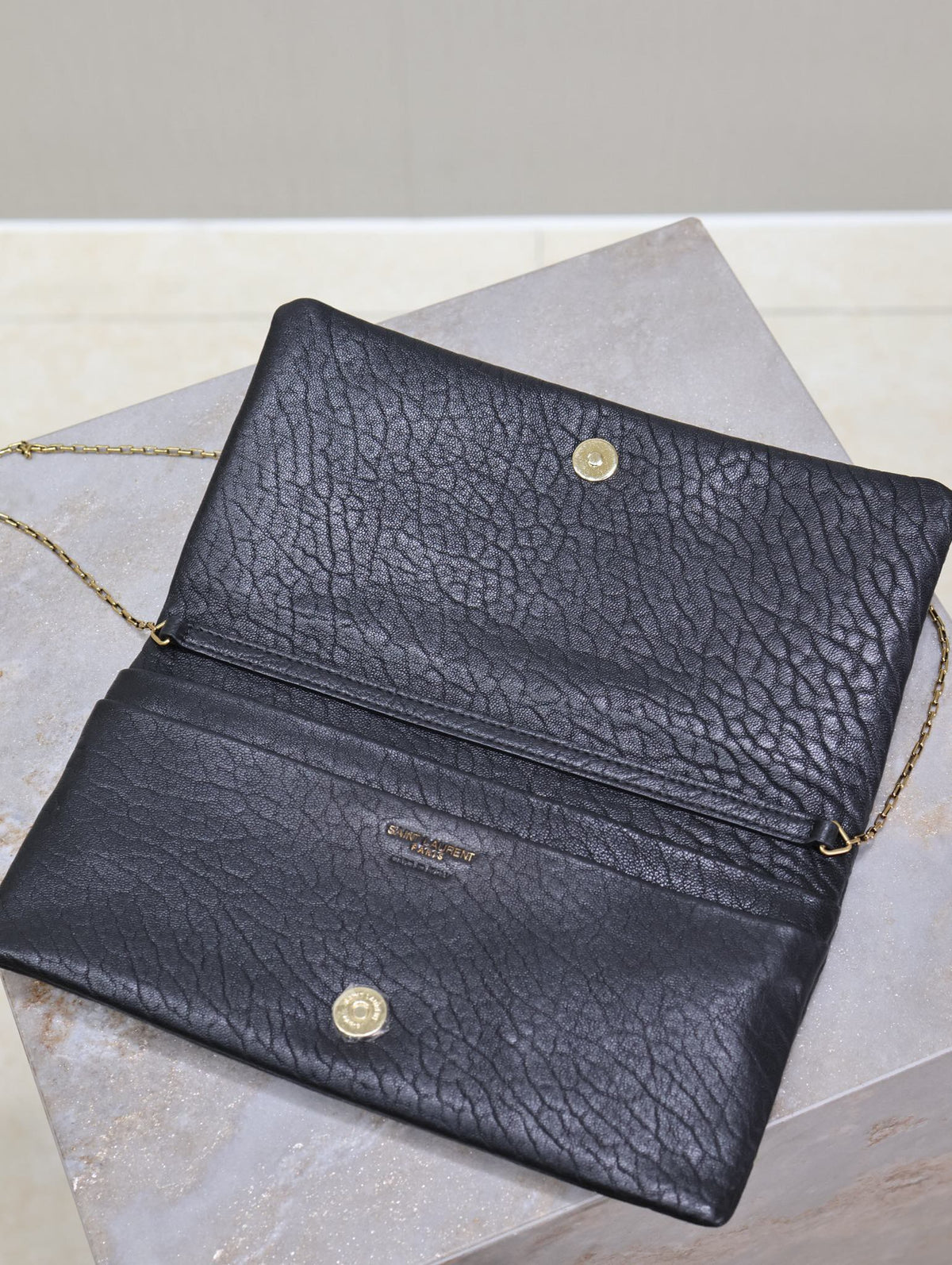 Saint Laurent Calypso Pouch 24 in Black Elephant Textured Lambskin Gold Logo