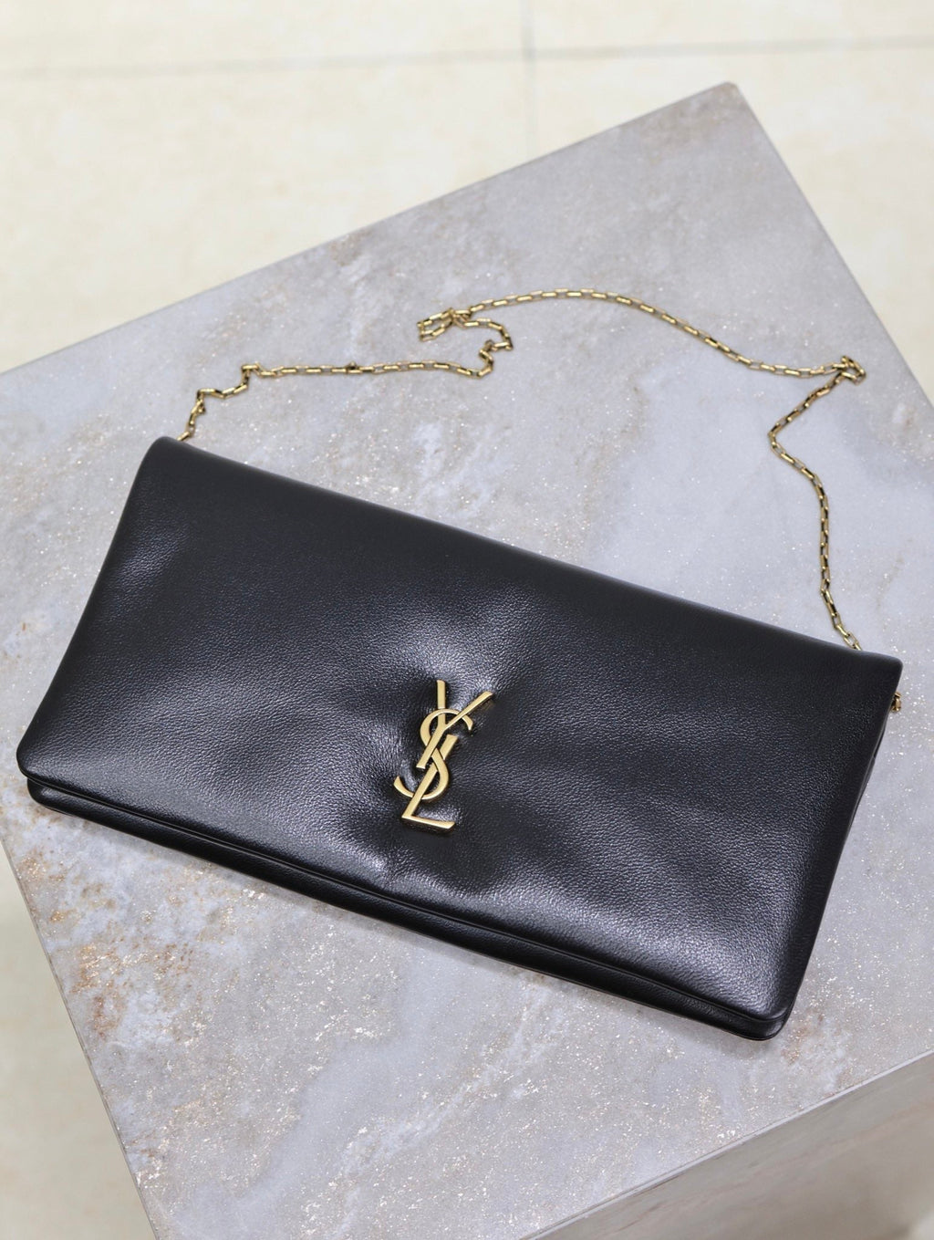 Saint Laurent Calypso Pouch 24 in Black Lambskin Gold Logo