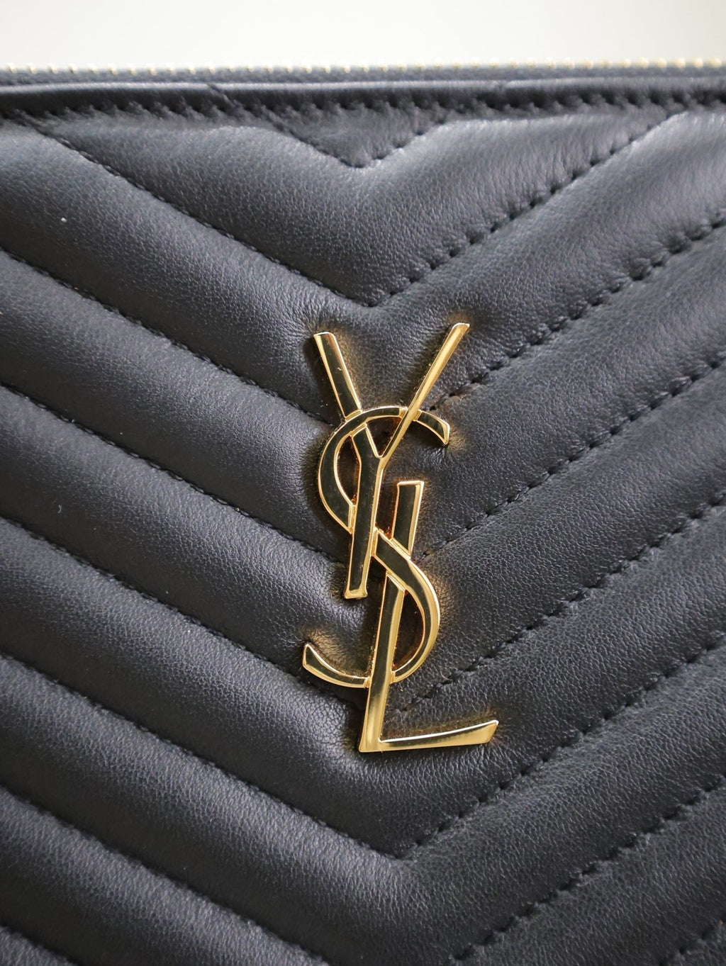 Saint Laurent Clutch 36 in Black Quilted Calfskin Gold Buckle