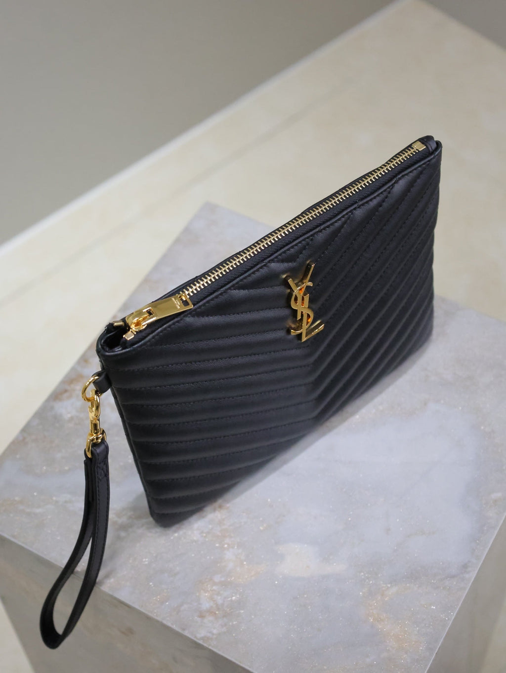 Saint Laurent Clutch 24 in Black Quilted Calfskin Gold Buckle