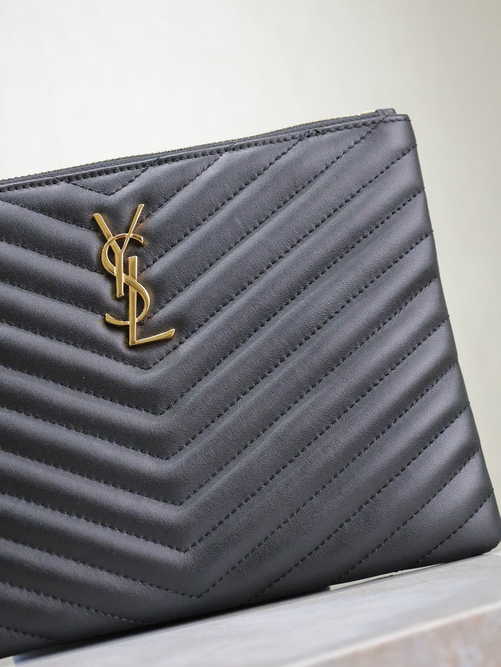 Saint Laurent Clutch 24 in Black Quilted Calfskin Gold Buckle