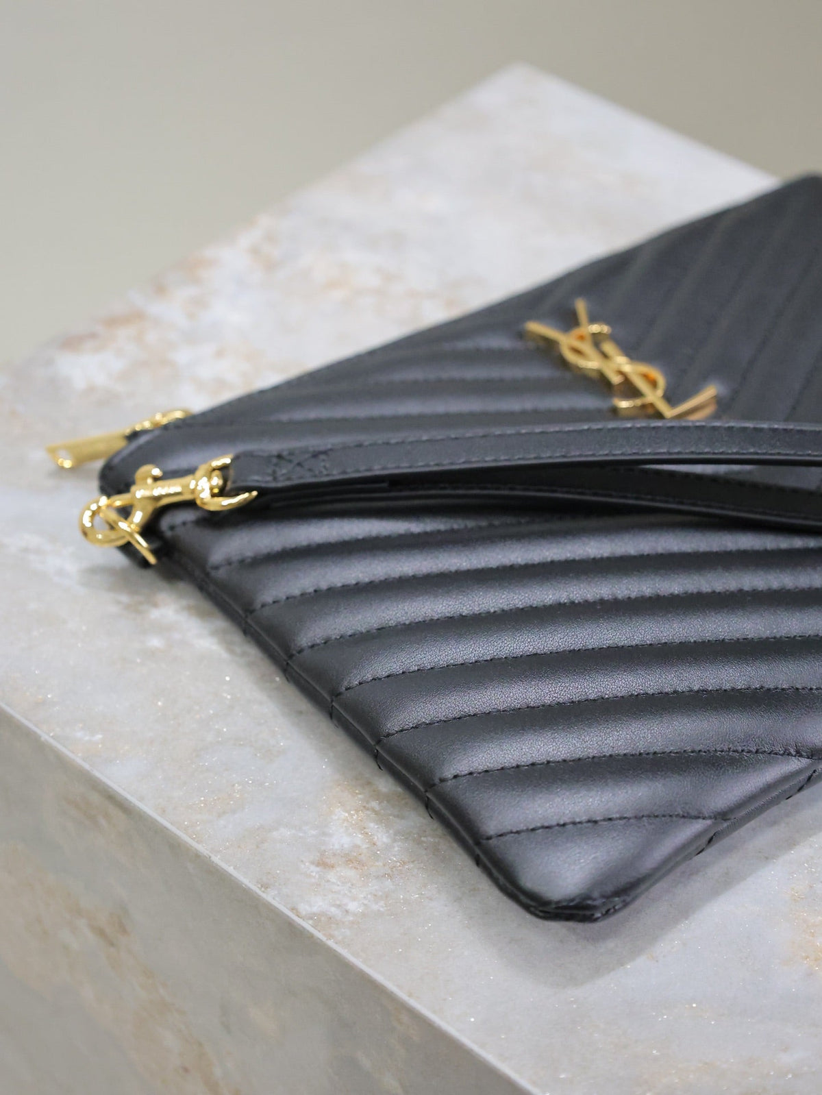 Saint Laurent Clutch 24 in Black Quilted Calfskin Gold Buckle