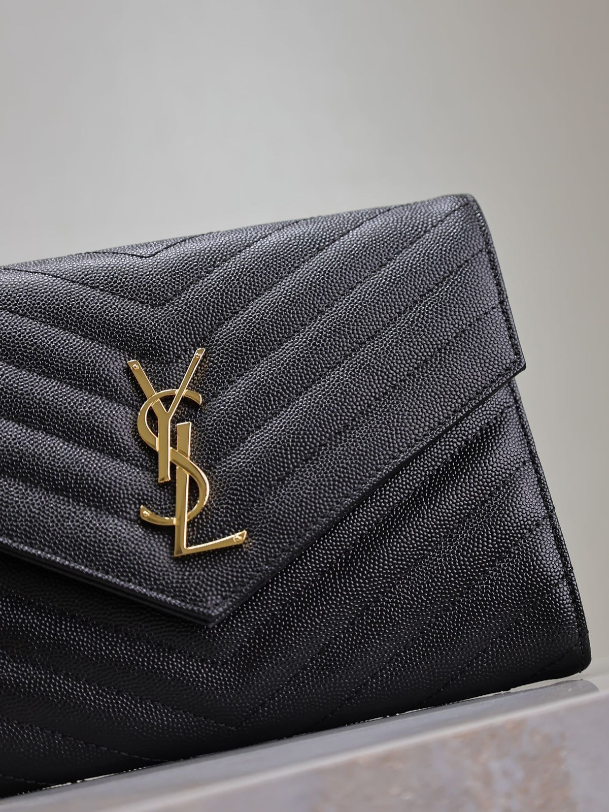 Saint Laurent Cassandre Clutch 21 in Black Lambskin Gold Hardware