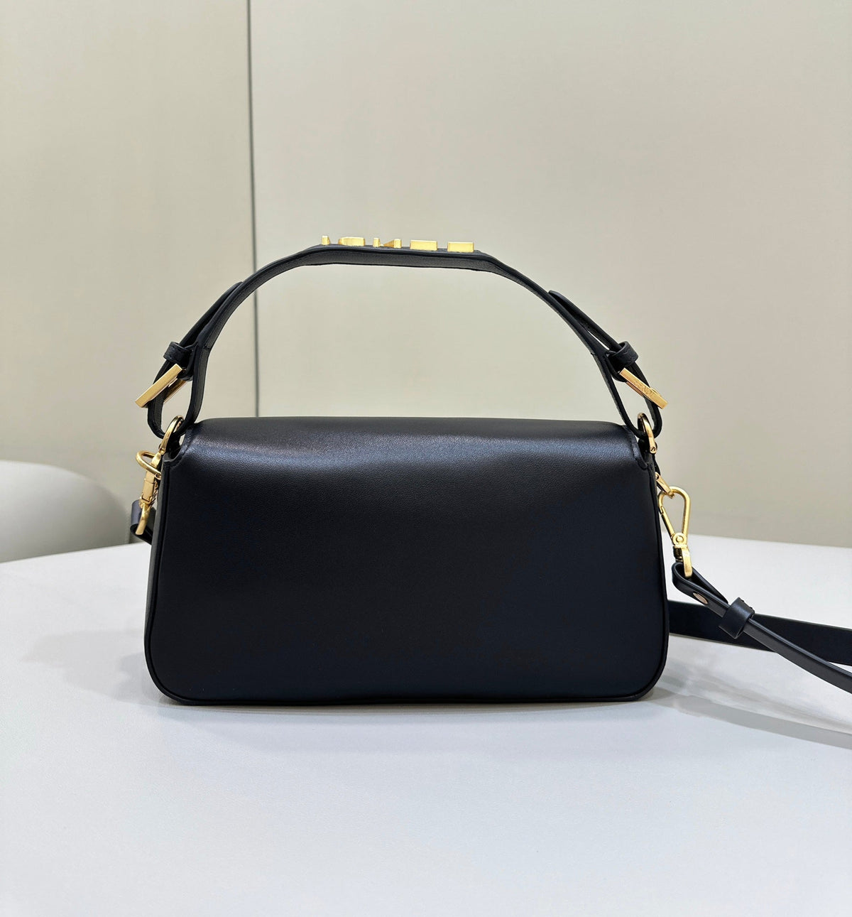 Baguette 27 in Black Smooth Calfskin Gold Hardware